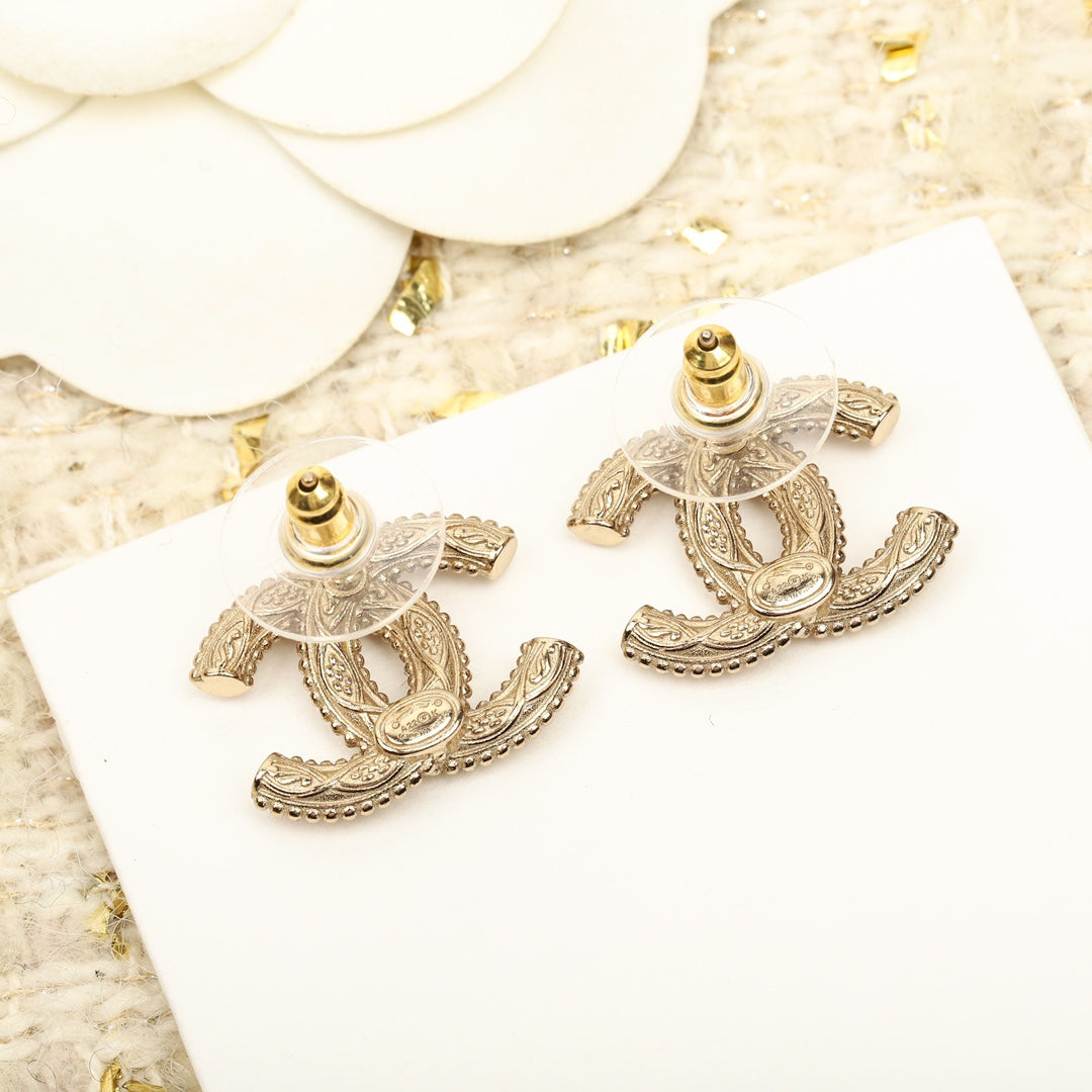 Chanel Double C Logo Gold Stud Earrings - product view 3